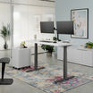 raised white slate finish desk in a home office setting